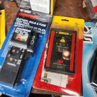 Box lot of New Tools in original package Dowrling Kit, Battery testers , Arrow T50 Stapler Black And Decker Drill Bits Hex Crimping tool