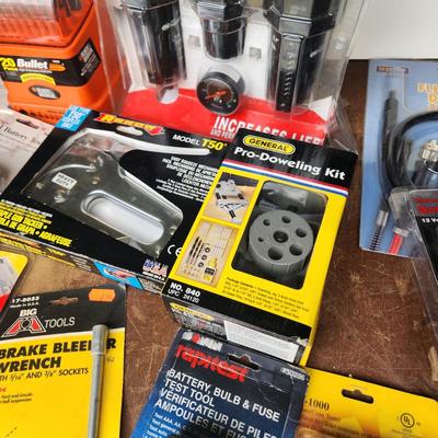 Box lot of New Tools in original package Dowrling Kit, Battery testers , Arrow T50 Stapler Black And Decker Drill Bits Hex Crimping tool
