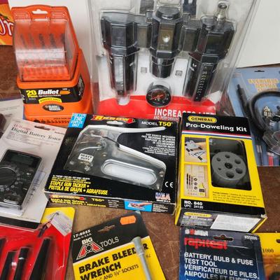 Box lot of New Tools in original package Dowrling Kit, Battery testers , Arrow T50 Stapler Black And Decker Drill Bits Hex Crimping tool