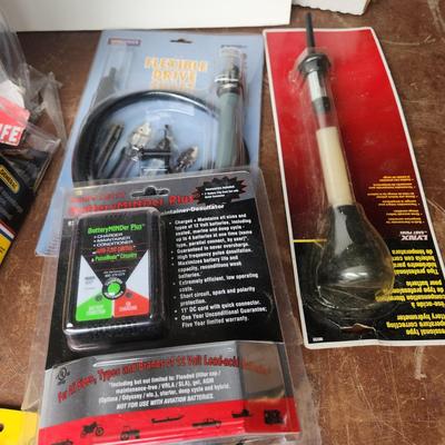 Box lot of New Tools in original package Dowrling Kit, Battery testers , Arrow T50 Stapler Black And Decker Drill Bits Hex Crimping tool