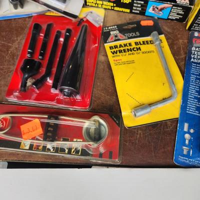 Box lot of New Tools in original package Dowrling Kit, Battery testers , Arrow T50 Stapler Black And Decker Drill Bits Hex Crimping tool