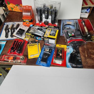 Box lot of New Tools in original package Dowrling Kit, Battery testers , Arrow T50 Stapler Black And Decker Drill Bits Hex Crimping tool