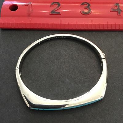 Very nice silver toned, Michael Kors hinge bracelet with turquoise