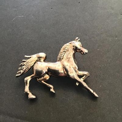 Vintage SilverTone horse Brooch by best