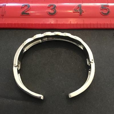 Very nice silver tone, hinged cuff bracelet