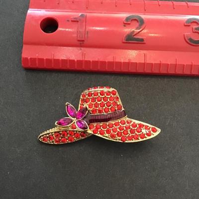 Vintage Monet Gold tone with red rhinestone, lapel pin hat