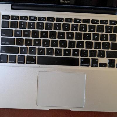 Two MacBook Pro model A1278 with original charges