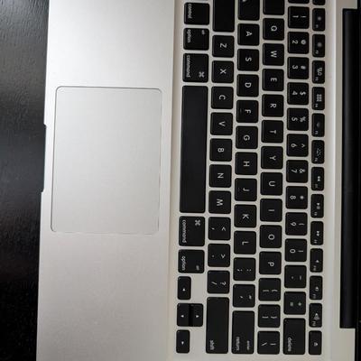 Two MacBook Pro model A1278 with original charges