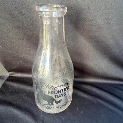Sale Photo Thumbnail #630: This is a RARE bottle!!  Plains Dairy predominantly used square bottles!  The round ones are very hard to find.