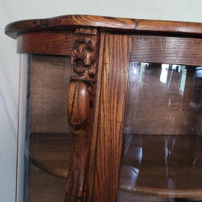 Sale Photo Thumbnail #610: Measures 58" tall, 36" at its widest and 17" deep.
Rounded glass front, unwrapped for photos but will be rewrapped for buyers transport. Not a blemish that I could see