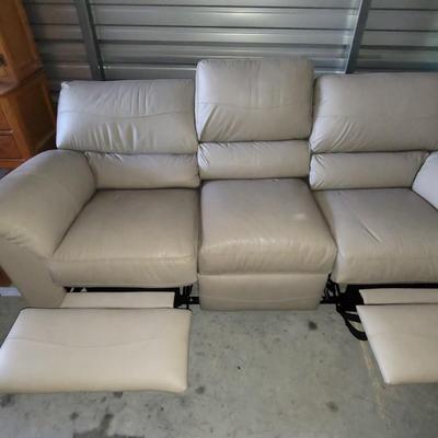 Sale Photo Thumbnail #641: About 88" wide amd a seat height of 19". It had some cardboard boxes sitting on it and those are the seat marks. Looks almost new and the leather seems to be perfect.