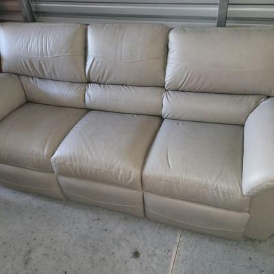 Sale Photo Thumbnail #635: About 88" wide amd a seat height of 19". It had some cardboard boxes sitting on it and those are the seat marks. Looks almost new and the leather seems to be perfect.