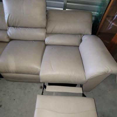 Sale Photo Thumbnail #642: About 88" wide amd a seat height of 19". It had some cardboard boxes sitting on it and those are the seat marks. Looks almost new and the leather seems to be perfect.