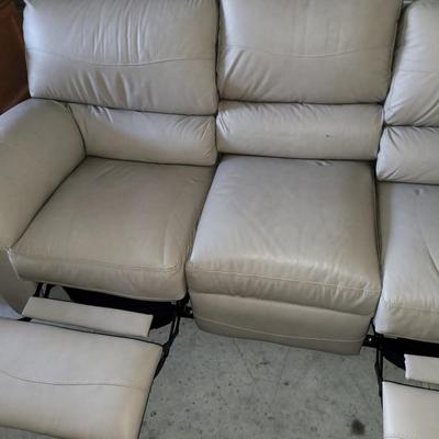 Sale Photo Thumbnail #640: About 88" wide amd a seat height of 19". It had some cardboard boxes sitting on it and those are the seat marks. Looks almost new and the leather seems to be perfect.