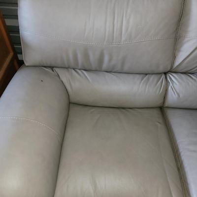Sale Photo Thumbnail #638: About 88" wide amd a seat height of 19". It had some cardboard boxes sitting on it and those are the seat marks. Looks almost new and the leather seems to be perfect.