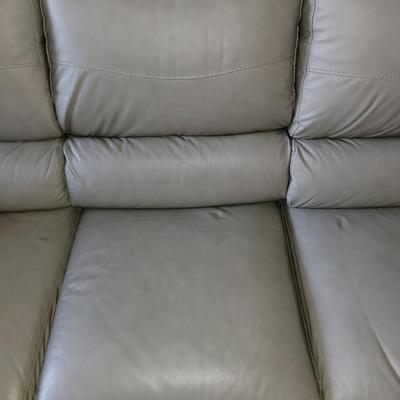 Sale Photo Thumbnail #637: About 88" wide amd a seat height of 19". It had some cardboard boxes sitting on it and those are the seat marks. Looks almost new and the leather seems to be perfect.