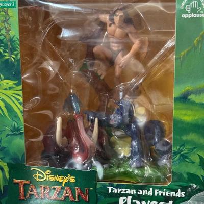 Ronald McDonald happy meal toys, Disney Tarzan.