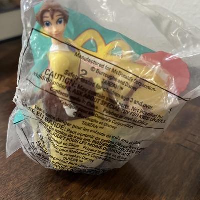 Ronald McDonald happy meal toys, Disney Tarzan.