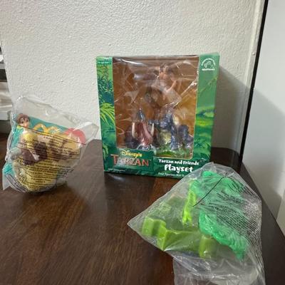 Ronald McDonald happy meal toys, Disney Tarzan.