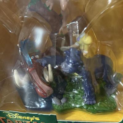 Ronald McDonald happy meal toys, Disney Tarzan.