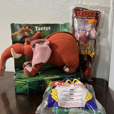 Disney Tarzan with Ronald McDonald happy meal toys.
