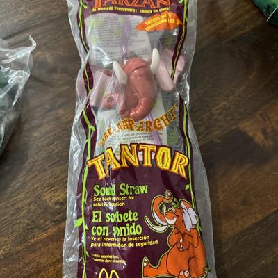 Disney Tarzan with Ronald McDonald happy meal toys.