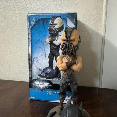 Head knocker Bane and Batman figure and Bat Mobile.