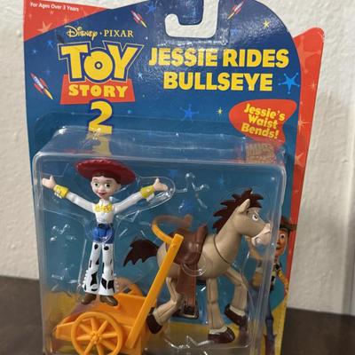 Vintage Toy story figures and Jessie rides Bullseye.