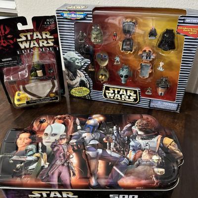 Star Wars tin can with Star Wars Micro figures.