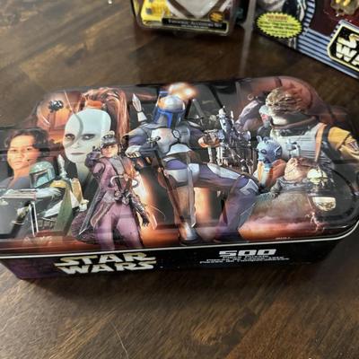 Star Wars tin can with Star Wars Micro figures.