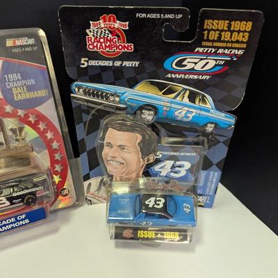 Sale Photo Thumbnail #1155: NASCAR Winner's Circle Dale Earnhardt & Racing Champions Richard Petty  1/64