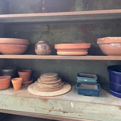 Sale Photo Thumbnail #2138: Mixture of terra cotta and ceramic pots.