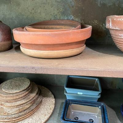 Sale Photo Thumbnail #2140: Mixture of terra cotta and ceramic pots.