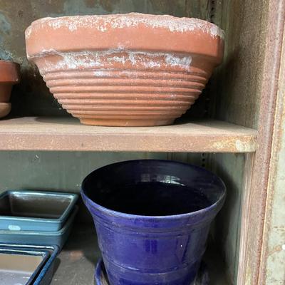 Sale Photo Thumbnail #2139: Mixture of terra cotta and ceramic pots.