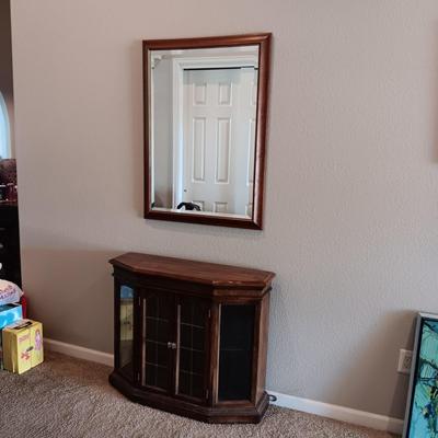LIGHTED FOYER DISPLAY CABINET WITH WOOD FRAMED BEVELED WALL MIRROR