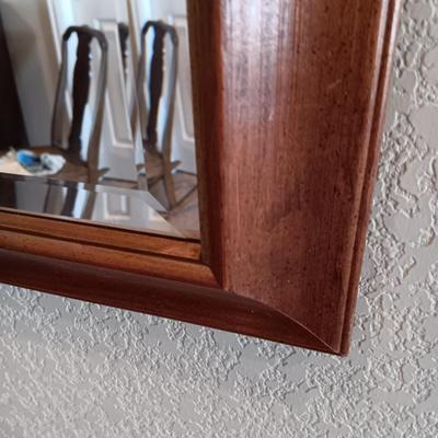 LIGHTED FOYER DISPLAY CABINET WITH WOOD FRAMED BEVELED WALL MIRROR