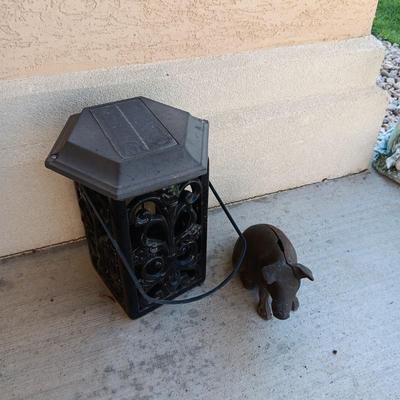 CAST IRON PIG BANK AND METAL CANDLE LANTERN