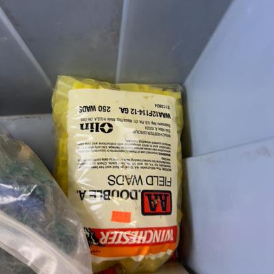 Tub full of Empty Shot Gun Shells and Wads 