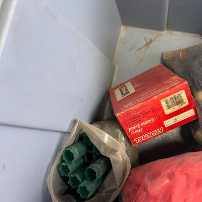 Tub full of Empty Shot Gun Shells and Wads 