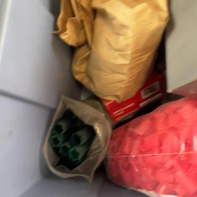 Tub full of Empty Shot Gun Shells and Wads 