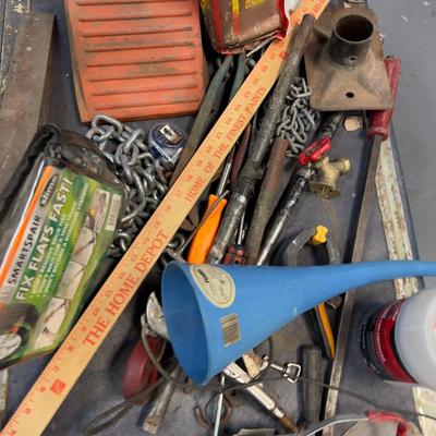 Pile of Garage Stuff w/Garbage Can 