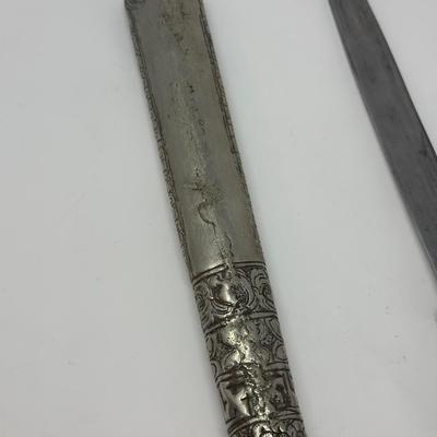 Sale Photo Thumbnail #165: 16” overall length
Antique 19th century intricately engraved dagger & scabbard of Tibetan or Bhutanese origin.