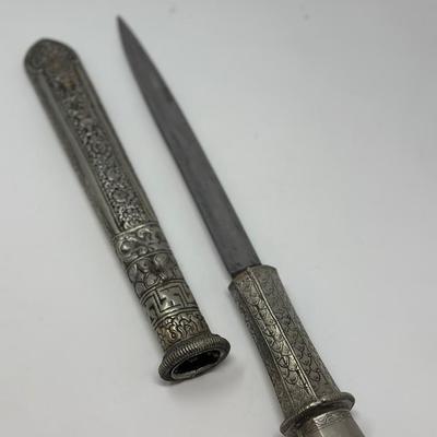 Sale Photo Thumbnail #155: 16” overall length
Antique 19th century intricately engraved dagger & scabbard of Tibetan or Bhutanese origin.