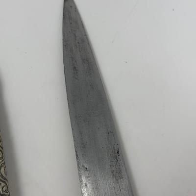 Sale Photo Thumbnail #157: 16” overall length
Antique 19th century intricately engraved dagger & scabbard of Tibetan or Bhutanese origin.