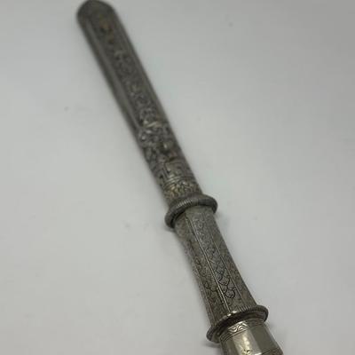 Sale Photo Thumbnail #156: 16” overall length
Antique 19th century intricately engraved dagger & scabbard of Tibetan or Bhutanese origin.