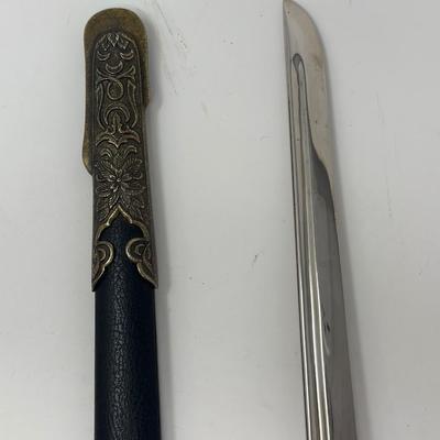 Sale Photo Thumbnail #187: Replica WWII. Made of metal. Non-sharp blade
