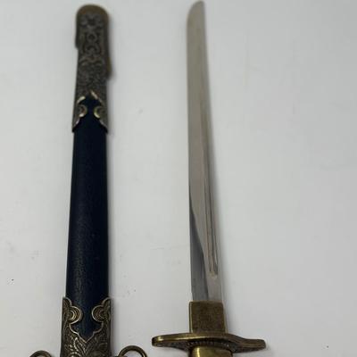 Sale Photo Thumbnail #192: Replica WWII. Made of metal. Non-sharp blade