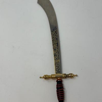 Sale Photo Thumbnail #206: Made in Spain
Size: 13 3/4”
Toledo Steel ornate sword shaped letter opener