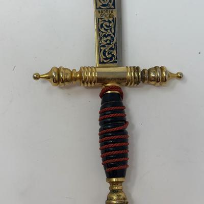 Sale Photo Thumbnail #208: Made in Spain
Size: 13 3/4”
Toledo Steel ornate sword shaped letter opener