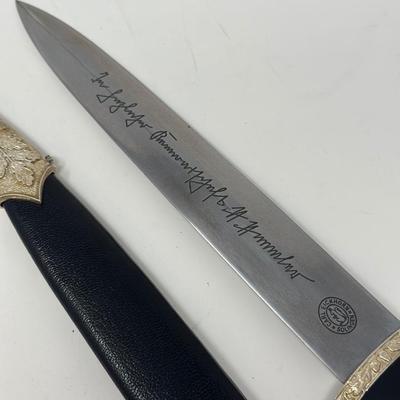 Sale Photo Thumbnail #217: Size: 14 2/2”
WWII German model SS honor dagger with the motto 'Meine Ehre Heisst Treue' etched on one side of the stainless-steel blade meaning 'Loyalty is my honor.' Etched on the reverse side of the dagger is 'In Herzlicher  Kameradschaft H. Himmler'